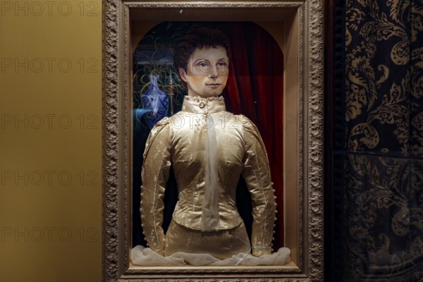 Opulent interior view of Larnach Castle with antique sculpture in a noble frame, Otago Peninsula, New Zealand