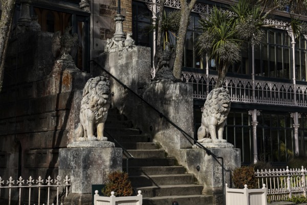 Stone staircase at Larnach Castle flanked by lion sculptures, Otago Peninsula, New Zealand