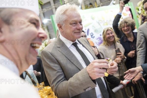 Alios Rainer (Federal Minister of Agriculture, Food and Home Affairs) tasting cheese cubes at the Green Week on the exhibition grounds in Berlin on 16 January 2026. The trade fair for the agricultural and food industry will take place from 16-25 January 2026