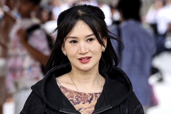 Smiling woman with black hair in busy street of Asakusa, Tokyo, Tokyo, Asakusa, Japan