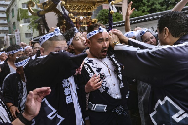 Attendees at the lively Sanja Matsuri shrine festival in traditional clothes, Tokyo, Asakusa, Japan