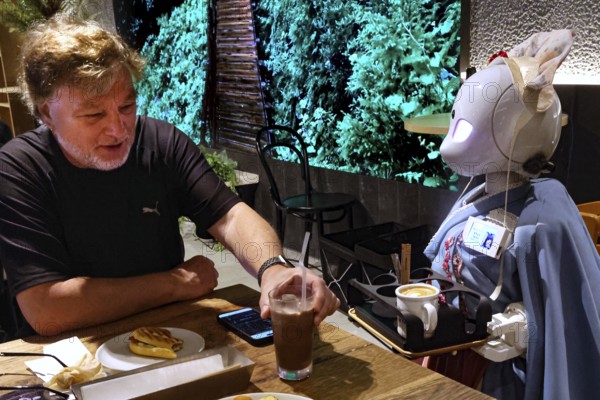 Interaction between humans and robots at Avatar Robot Café in Tokyo, Tokyo, Japan