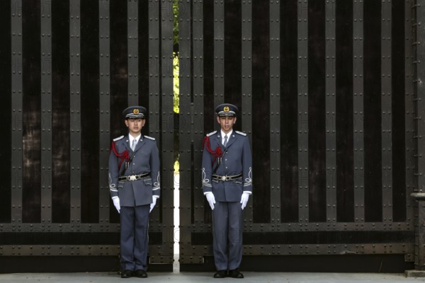 Guards in uniforms at the Imperial Palace gate during the changing of the guard, Tokyo, Japan