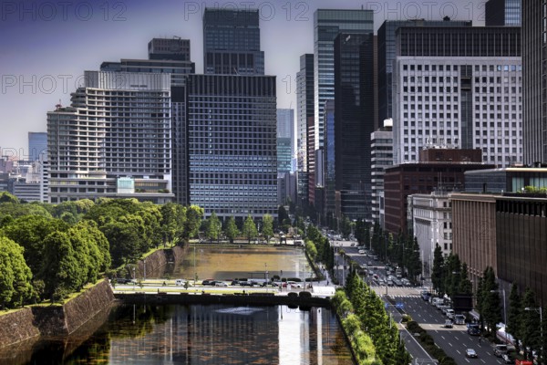 View from roof terrace of modern buildings and the Imperial Palace in Tokyo, Tokyo, Nihombashi, Japan