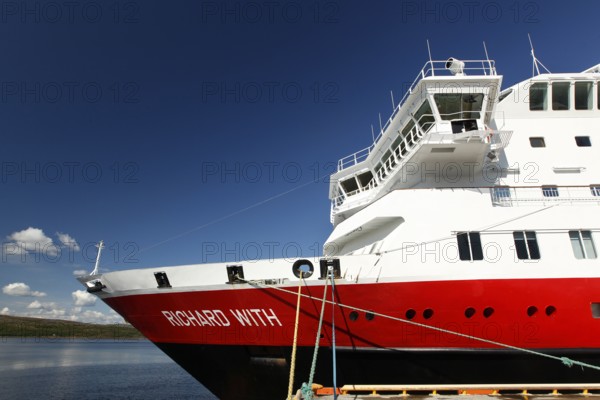 Bow of a Hurtigruten ship in Kirkenes under clear blue sky, Kirkenes, Norway