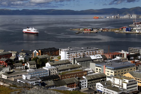 Hurtigruten ship approaches Hammerfest harbour, Hammerfest, Finnmark, Norway