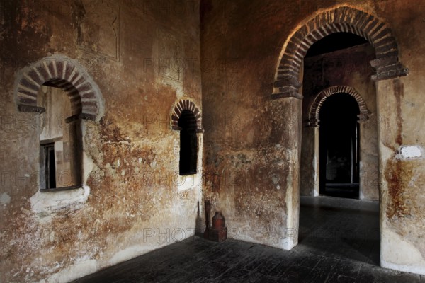 Stone wall with arches and windows inside a castle in historic Gondar, Gondar, Amhara, Ethiopia