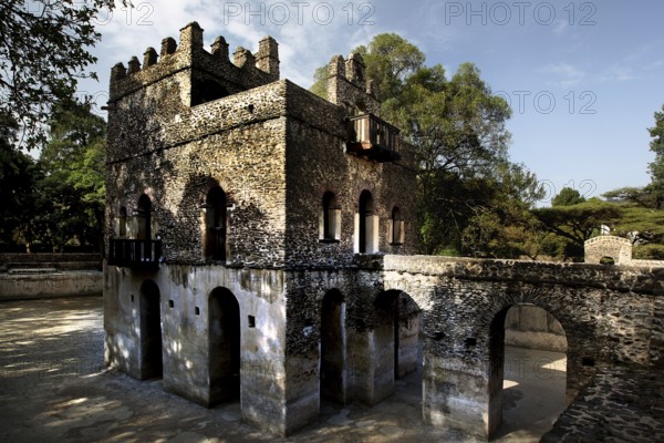 Historic stone architecture with arches and a traditional character in the bath of Fasilidas, Gondar, Amhara, Ethiopia