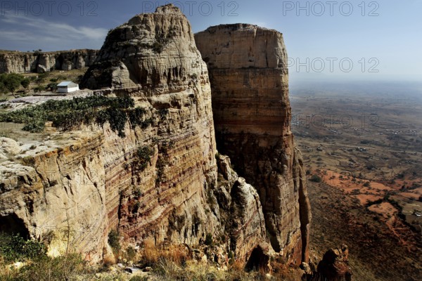 Massive rock walls near the monastery in the Gheralta region with a wide panorama, zero