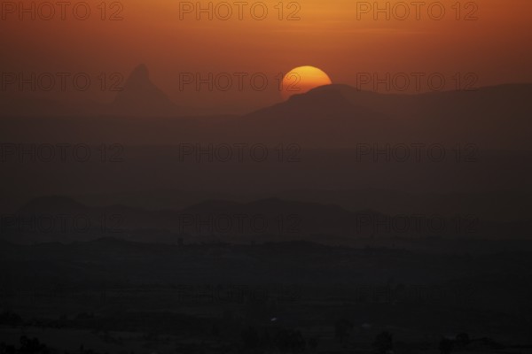 Spectacular sunset at Gheralta Lodge with silhouetted mountains, Hawzien, Tigray, Ethiopia