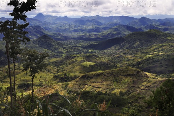 Wide view of a hilly landscape with thick forests and deep valleys in Konso, Konso, region, Ethiopia