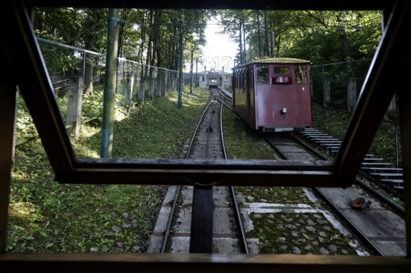 Historic Aleksotas funicular runs through a wooded section in Kaunas, Kaunas, Kaunas, Lithuania