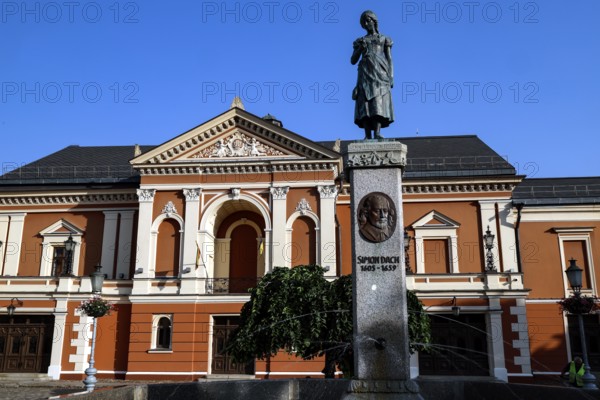 Historic theatre on Theatre Square with the Angel of Tharau statue in the old town, Klaipeda, Klaipeda County, Lithuania