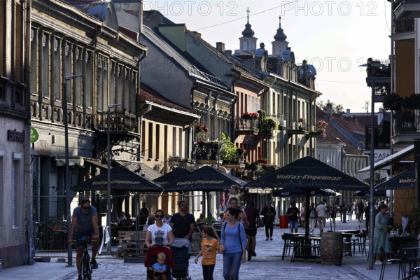 Vivid street scene of Vilnius Gatve in Kaunas with people and historic facades, Kaunas, Kaunas, Lithuania
