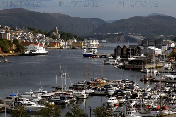 Kirkelandet marina with views of Gomalandet and Nordlandet, surrounded by mountains and water, Kristiansund, Møre og Romsdal, Norway