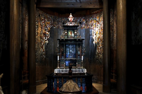 On display altar with ornate carvings in the stave church, Heddal, Norway