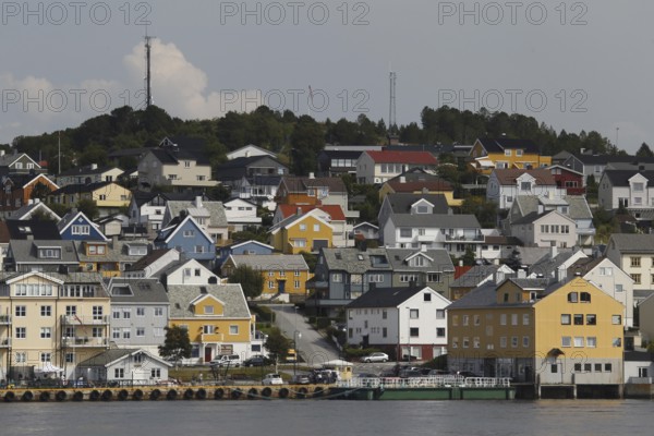 Panorama of Nordlandet in Kristiansund with densely connected colorful houses on the coast, Kristiansund, Møre og Romsdal, Norway