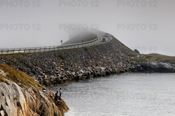 Atlantic road crosses the sea through fog and connects small islands, Atlanterhavsveien, Møre og Romsdal, Norway