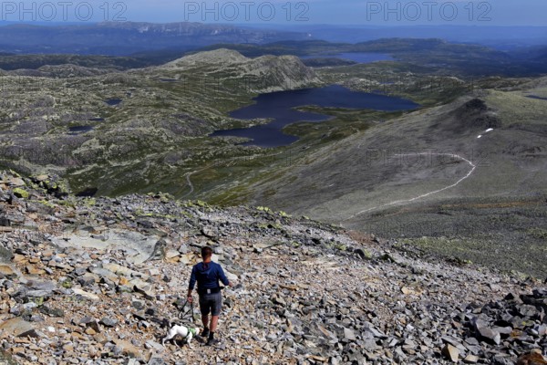 Extensive views from Gaustatoppen peaks, trails and valleys in natural surroundings, zero