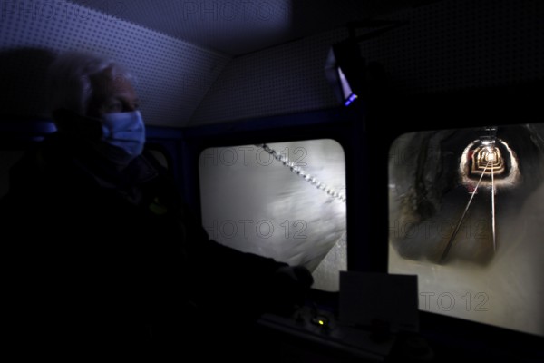 Darkly lit interior of the Gaustabanen cable car, mystical atmosphere, zero