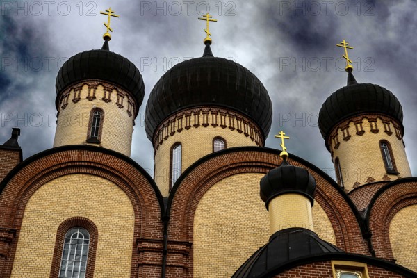 Detail of the main Orthodox church in the Pühtitsa nunnery with distinctive domes, Kuremäe, Estonia