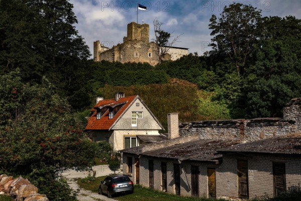 View of Rakvere Old Town with the Teutonic Order Castle in the background, surrounded by green foliage, Rakvere, Estonia