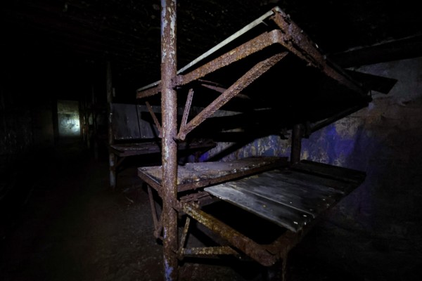 Dark abandoned bunker with rusty metal frames, Tahkuna, Hiiumaa, Estonia