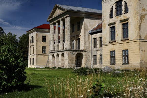 Historic building with decorated facades surrounded by nature in the Kolga manor house, Kolga, Estonia
