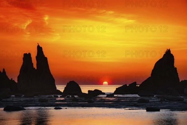 Impressive rock formations at sunrise along the coast of Kushimoto, Kushimoto, Japan