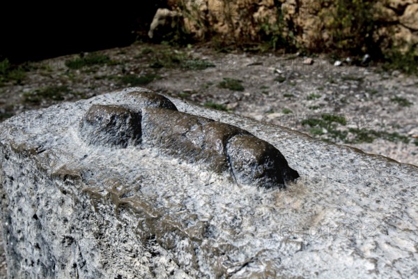 Stone relief in the form of a phallic symbol in the ruins of Volubilis, Volubilis, Fès-Meknès, Morocco