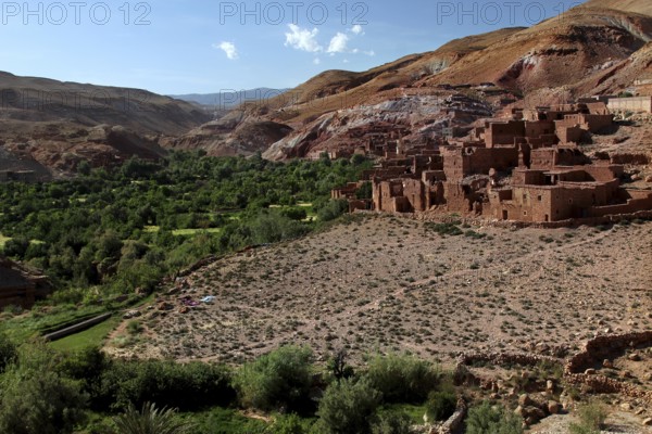 Old village made of earthen buildings in a mountainous area in the Ounilla Valley