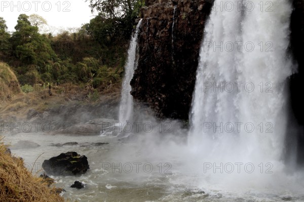 Water plunges powerfully over rocks in natural environment, Tisissat, Ethiopia