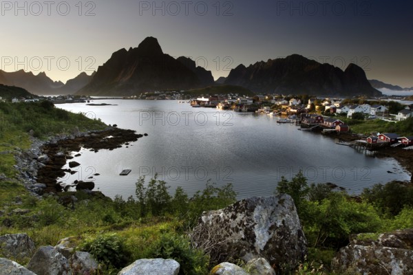 Reine and Hamnøay, surrounded by lakes and the dramatic Lofoten mountains, Reine, Moskenesøy, Norway