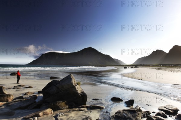 Sandy beach beach in Flakstad with mountain views and calm water, Flakstad, Flakstadøy, Norway