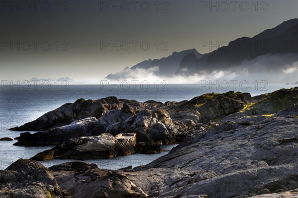 Rough coastal landscape in fog in Vestvågøy, Neslandsveien, Vestvågøy, Lofoten