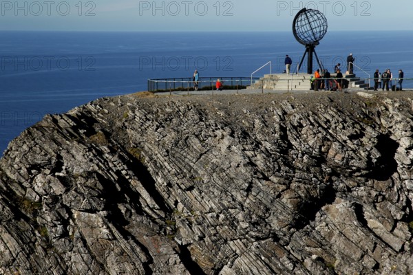 Panorama of cliffs at the North Cape with the globe and sea in the background, North Cape, Magerøya, Norway