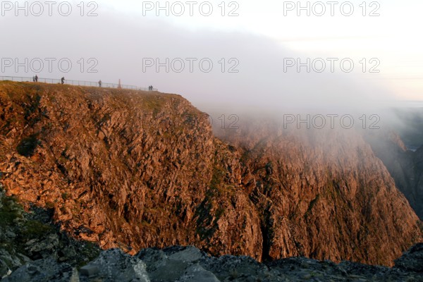 View of the dramatic mist-wrapped cliffs at the North Cape, North Cape, Magerøya, Norway