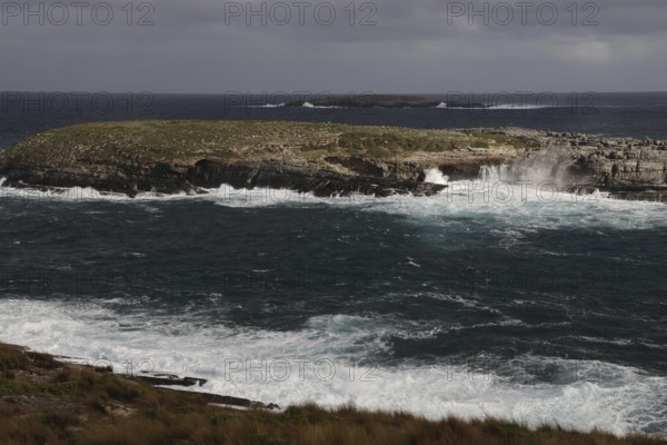 Dramatic coastal scene with turbulent seas and stormy sky near Cape du Couedic, Kangaroo Island, South Australia, Australia