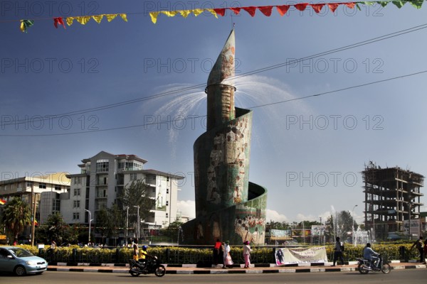 Monument in an urban environment with water fountain and flags, Awassa, Sidama, Ethiopia