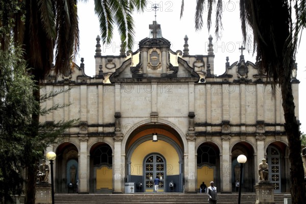 Impressive façade of the Trinity Church in Addis Ababa, framed by palm trees, Addis Ababa, null, Ethiopia