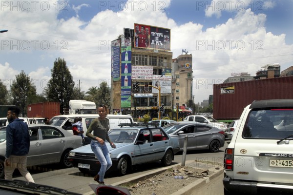 Busy urban environment under cloudy sky, Addis Ababa, Ethiopia
