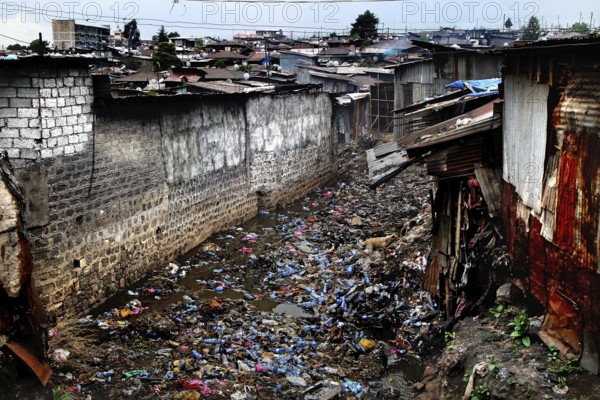 Dilapidated street full of trash and abandoned buildings in the Mercato of Addis Ababa, Addis Ababa, Ethiopia