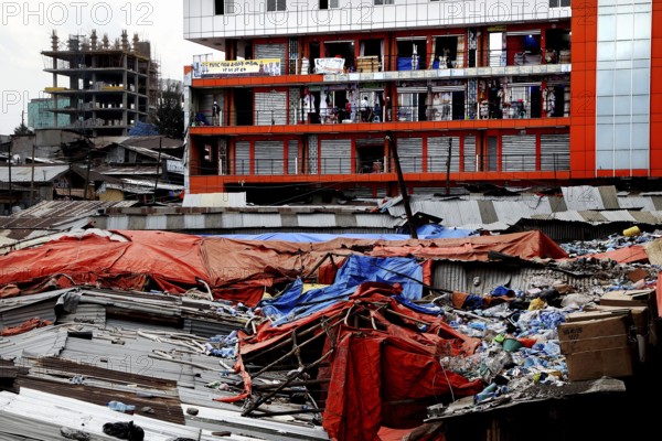 Urban backdrop with modern buildings and construction in the foreground, Addis Ababa, Mercato, Ethiopia