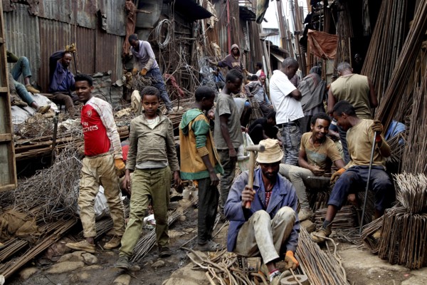Craftsmen work on metal work on the busy Mercato in Addis Ababa, Addis Ababa, Ethiopia