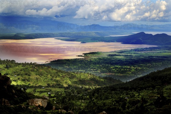 Panorama of Lake Chamo with surrounding green hills and dramatic cloud formations, Lake Chamo, Ethiopia