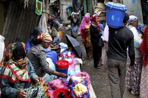 Bustling market street full of people and colorful goods, Addis Ababa, Mercato, Ethiopia