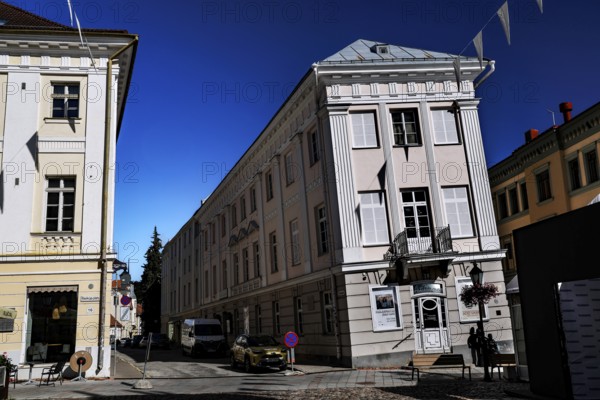 The Leaning House in the old town of Tartu shows distinctive architectural styles and clear blue skies, Tartu, Estonia