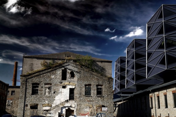 Contrast between historic and modern architecture in the Rotermann quarter, gloomy sky, Tallinn, Harju, Estonia