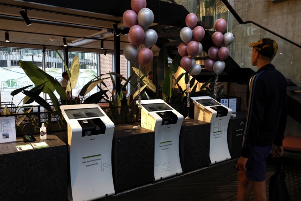 Check-in area at Hotel City Box Tallinn with modern terminals and decoration in the Rotermann Quarter, Tallinn, Harju, Estonia