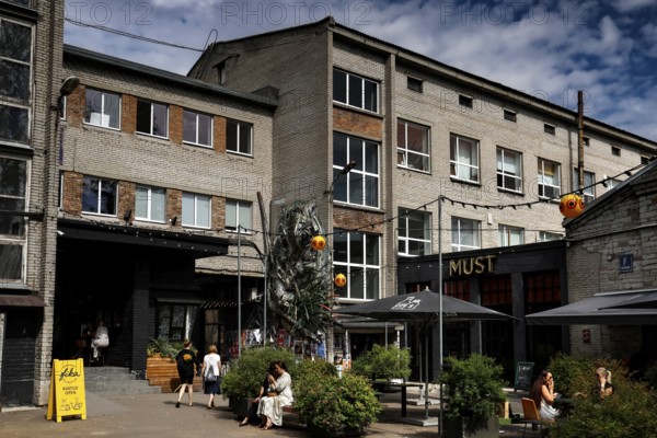 Lively café and creative office scene in the Telliskivi Creative Campus, Tallinn, Kelmiküla, Estonia